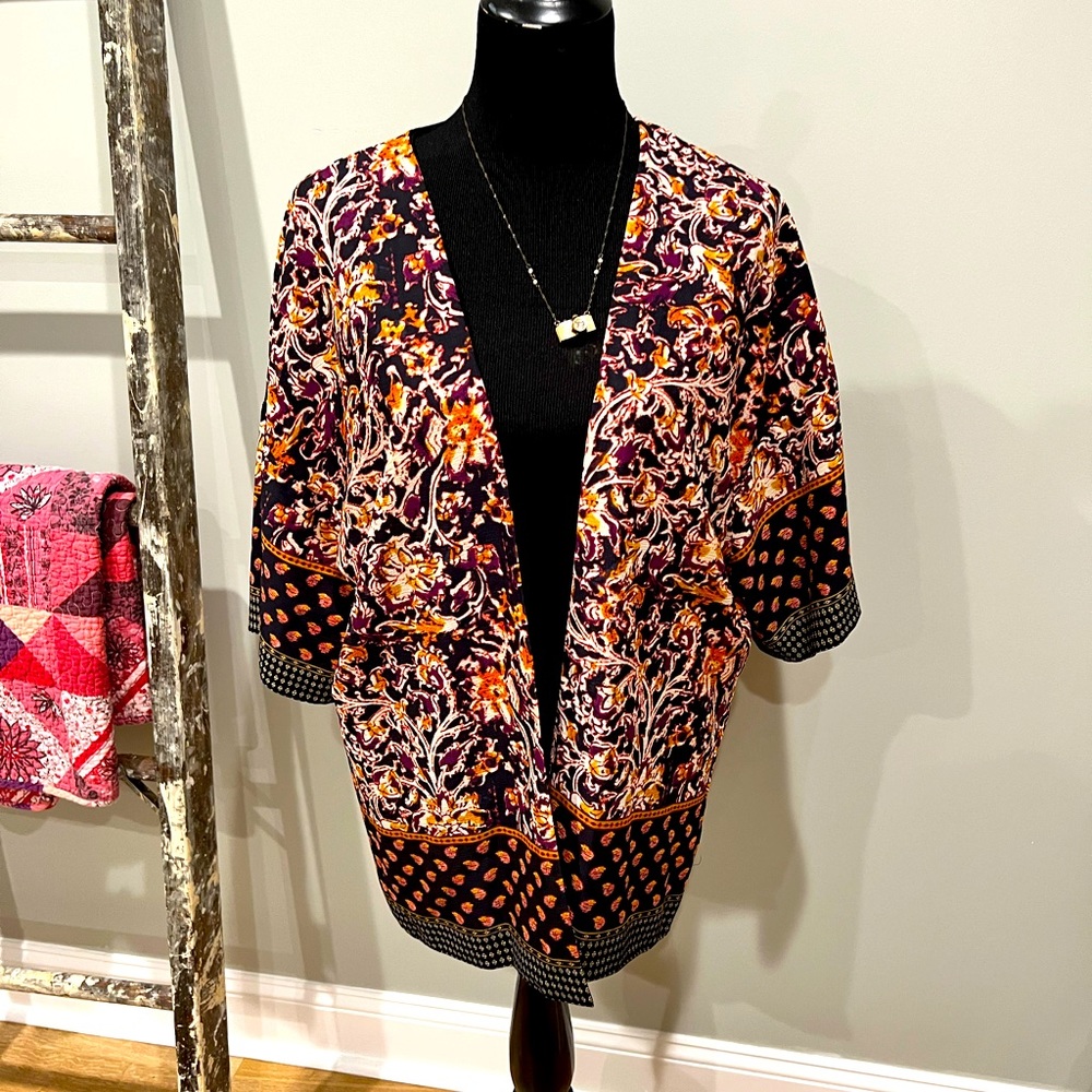Beautiful cover/wrap by Liz Claiborne